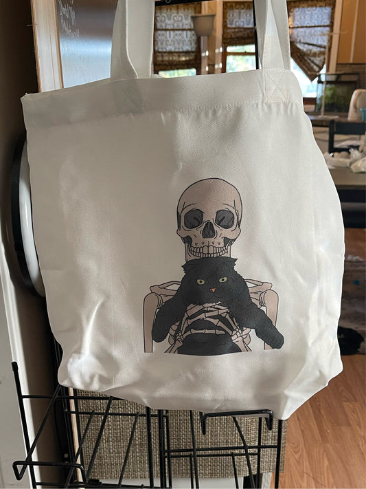 Skeleton Holding A Cat Tote Bag